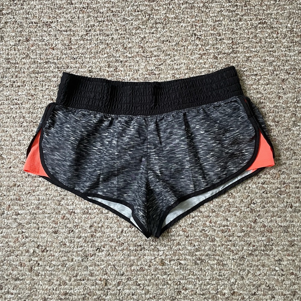 Women’s black and orange athletic shorts